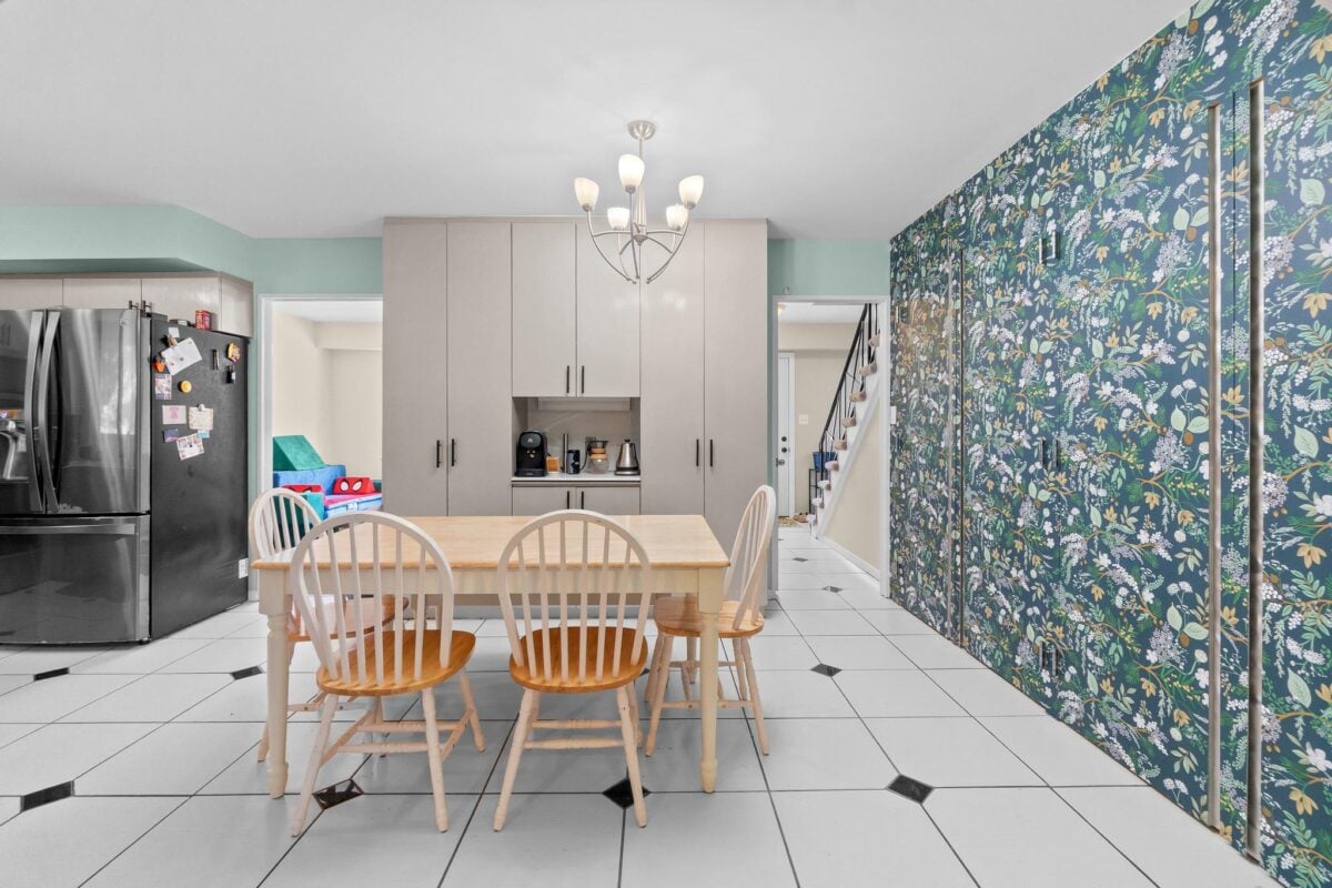 Dining area with stone feature wall