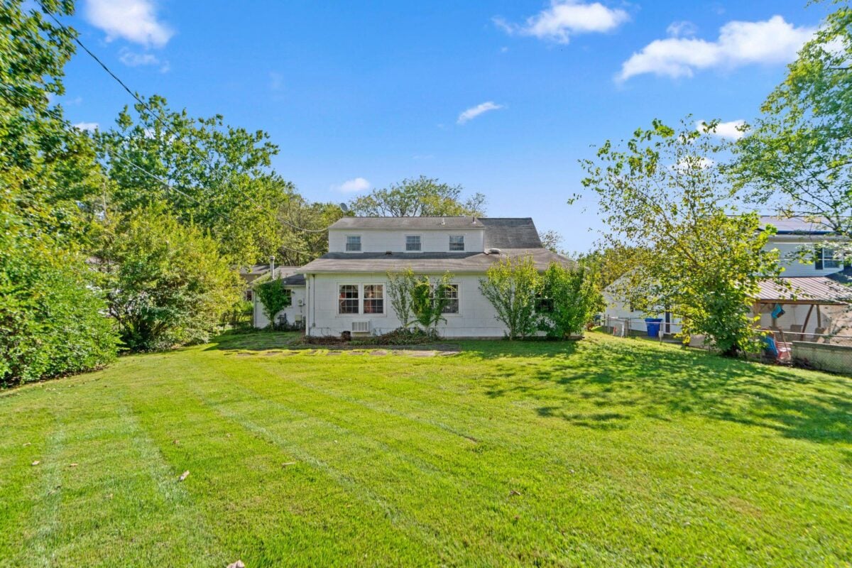 Rear of the home with the addition and backyard